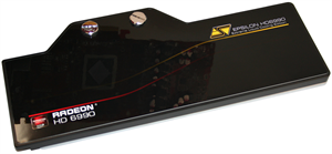 High gloss upper surface reflecting a graphics card overhead